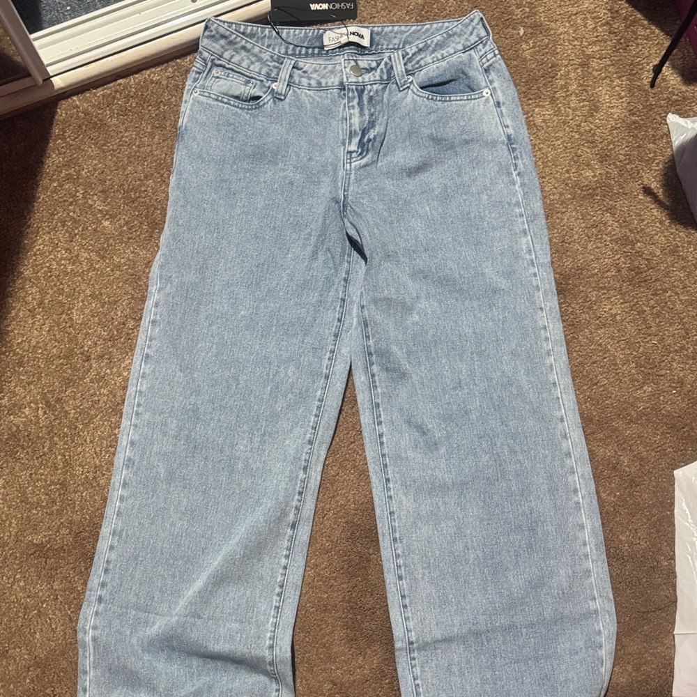 Stylish Blue Jeans with Pink Bow Detail - Picture 5 of 10